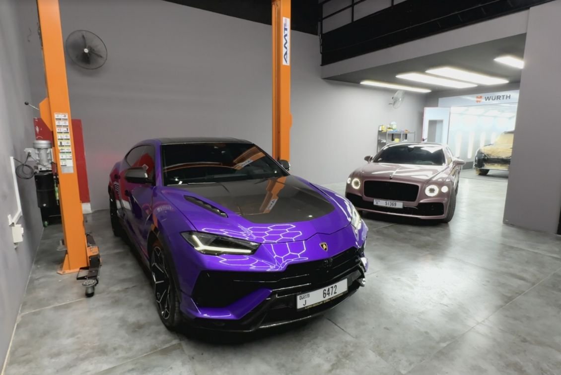 Supercars inside OTR Autos car repair garage in Al Quoz Dubai